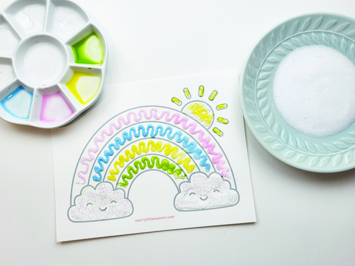 A finished salt art picture using a rainbow template. 
